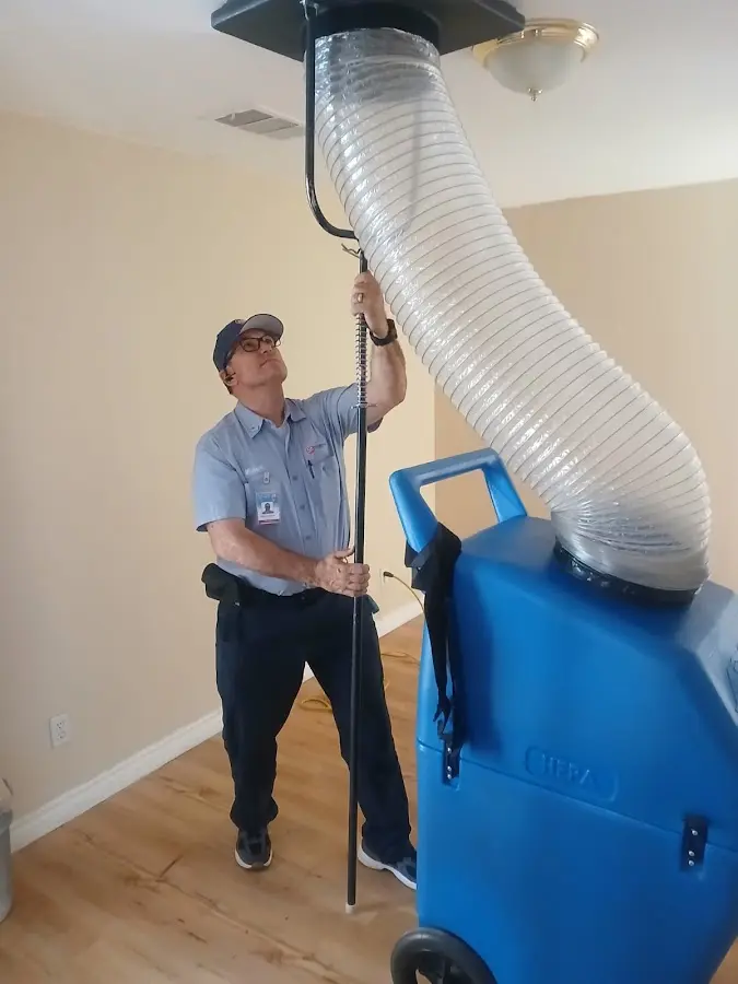HVAC Installation technician using HEPA equipment in Anna